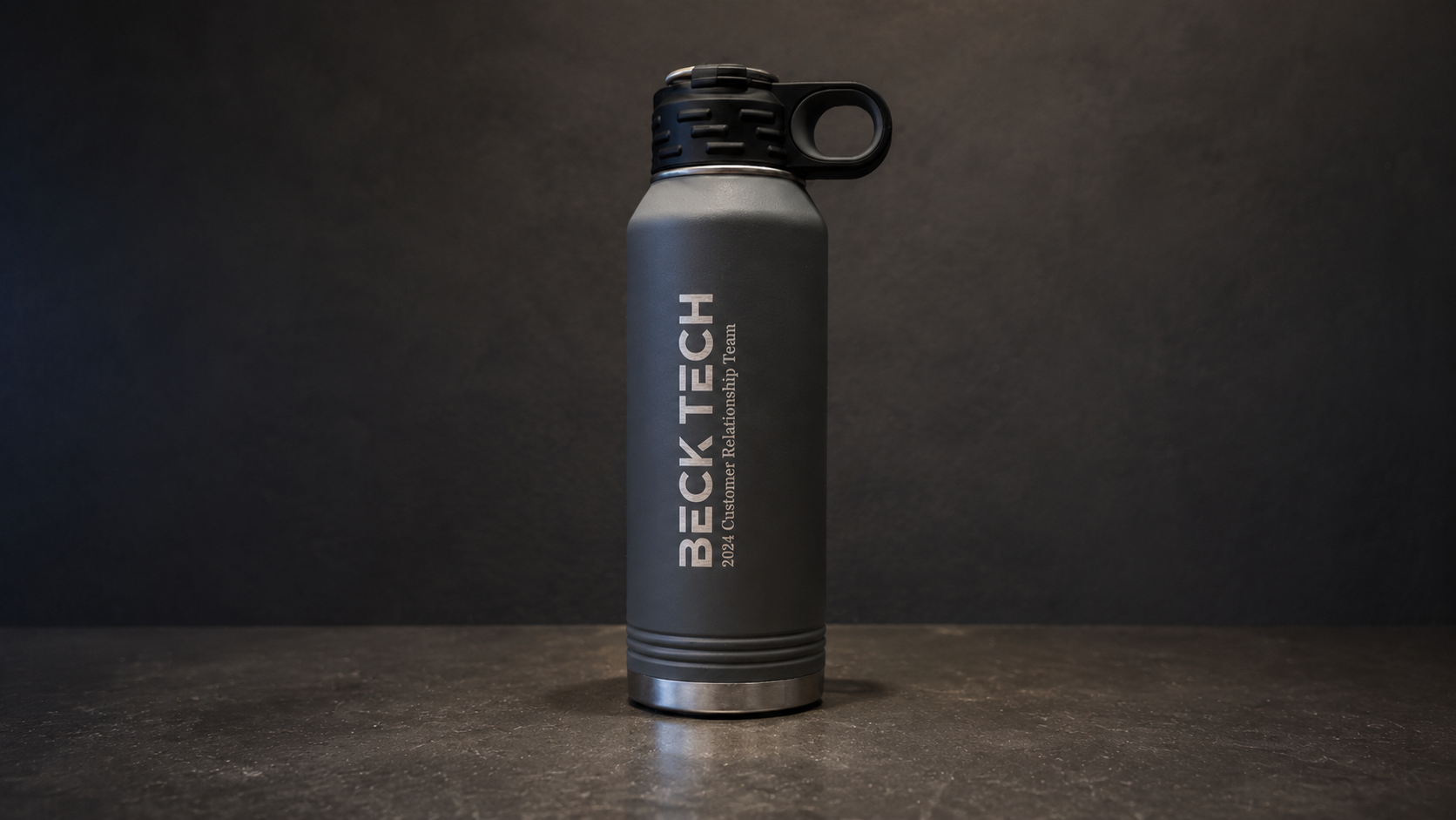 32oz powder-coated water bottle with custom engraved logo
